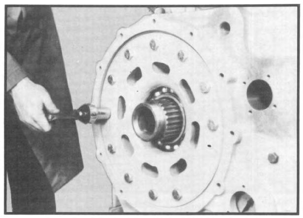 lower shaft rear bore and tapping the face plate flush against the housing. (See fig. 147.