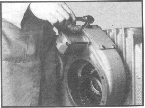 Apply cover plate gasket to PTO/ declutch housing. Fig. 182 15.