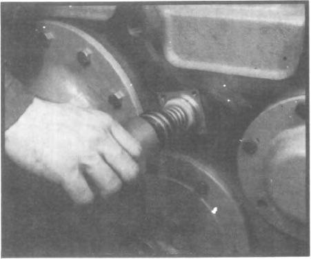 Place small o-ring over threaded end of neutral shift shaft. 14. Place piston over neutral shaft with the shallower of the two grooves toward shaft. (See fig. 167) Fig. 200 15.