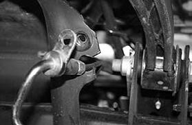 Remove the factory lower control arm bolts / alignment cams and save.