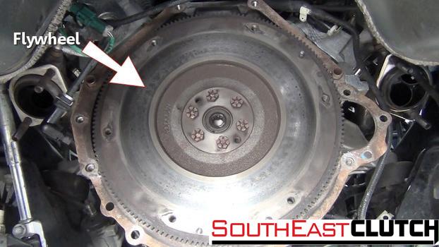 Check the Flywheel: The clutch mating surface of the flywheel will now be exposed.