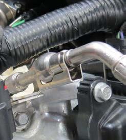 Then remove the fuel line extension from the fuel pump using a