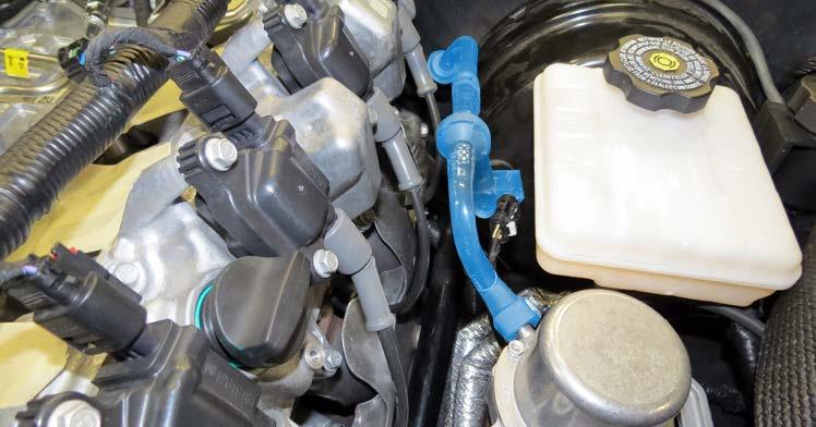 37. Unplug the brake booster check valve harness connector.