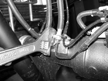 Perform steering sweep to ensure front brake hoses have adequate slack and do not contact any rotating, mobile or heated members. Inspect rear brake hoses at full extension for adequate slack.