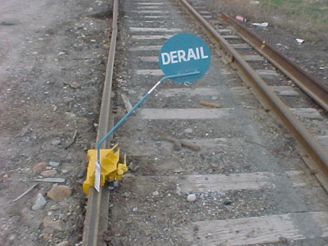 1.21 Derail A fixed or portable device designed to cause