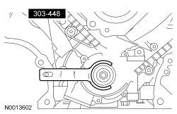 Page 12 of 18 5. Position the crankshaft with the Crankshaft Holding Tool, then remove the tool. 6.