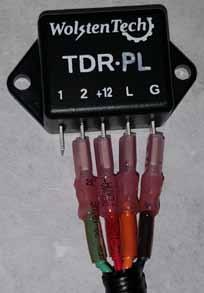 The female spade terminals connect to the relay: Terminal 1: not used Terminal 2 : Activation Signal (Green wire) Terminal +12: Voltage