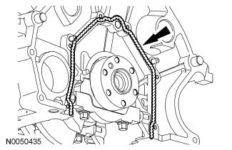 Follow the directions on the packaging. Failure to follow this procedure can cause future oil leakage. Install the crankshaft rear seal retainer plate and the 6 bolts.