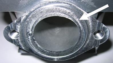 Machined surface can be either flat or show a circular sealing bump.