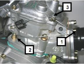 By means of the steel cable the engine must be sealed on one Allen screw (pos. 1) of the intake flange, on one stud screw (pos. 2) of cylinder and one Allen screw (pos.