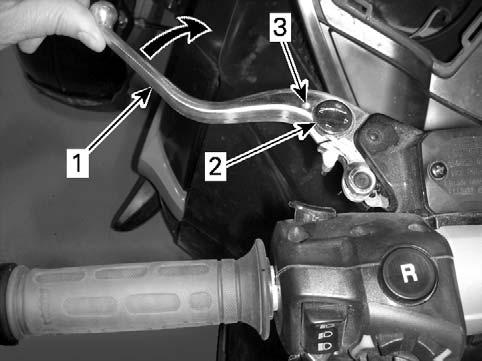 1.1 Push the clutch lever forward to release the adjuster dial. Hold in position. 1.2 Turn the adjuster dial to the desired position aligning the dial number with the dot on the lever. 1.3 Release the clutch lever.