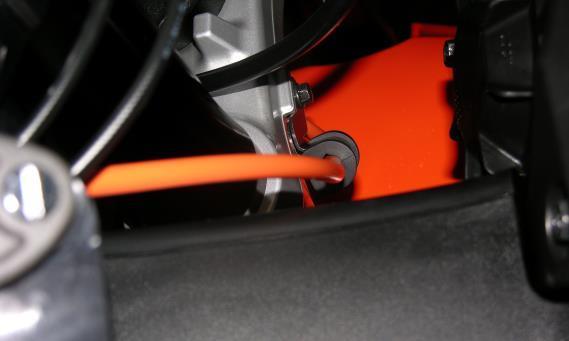 Check functionality. Install the supplied longer stainless steel braided brake line.
