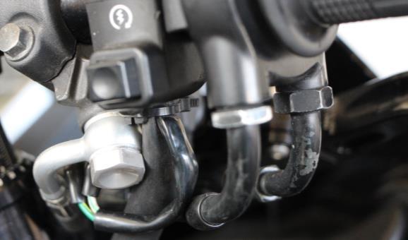 Align the master cylinder. Check (with no pressure in the system) the master cylinder if you can pull the lever towards the handlebar without hitting any object.
