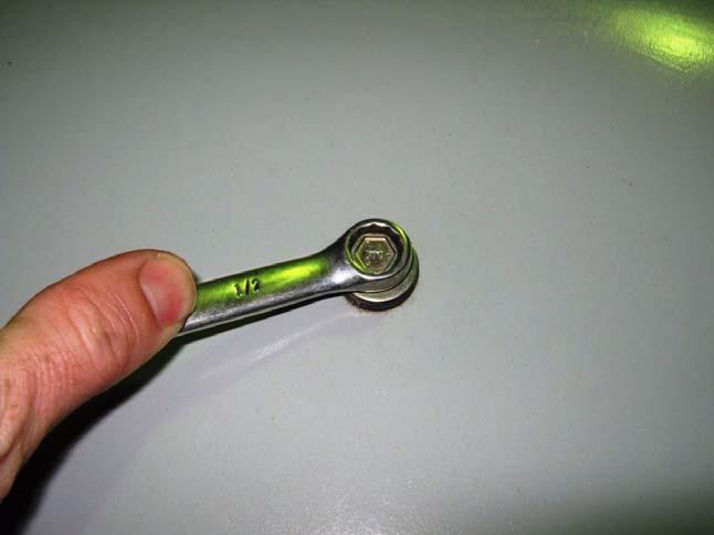 Installation Procedure 6. Remove the bolt using a 1/2 wrench.
