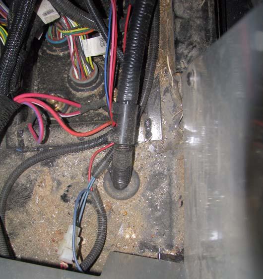 Route Ethernet Cable Into the Cab 5. Feed the Ethernet Cable into the cab through the cab floor hole. See Figure 4-5.