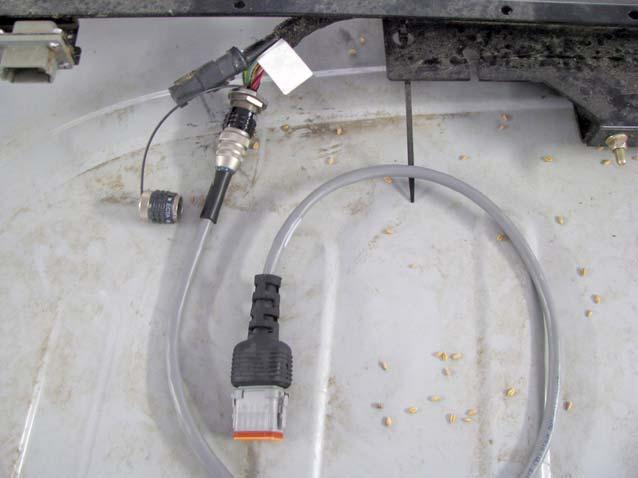 Connect the Agco AutoGuide Adapter Cable Harness. Connect the Agco AutoGuide Adapter Cable Harness. 1. Connect the Agco AutoGuide Adapter Cable Harness to the existing factory CAN adapter.