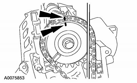 3. Scribe a location mark on the timing chain and the camshaft phaser sprocket assembly. 4.