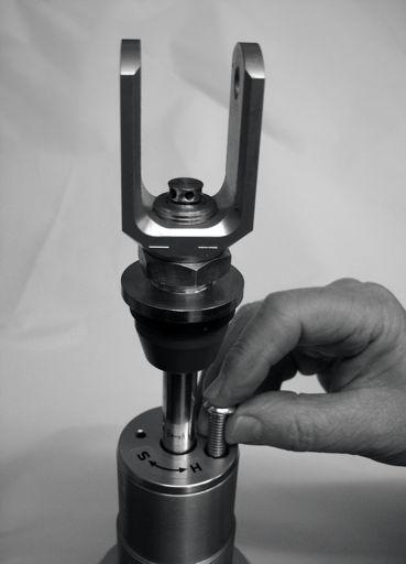 ADJUSTING THE HIGH SPEED COMPRESSION DAMPING The high speed compression damping adjuster on a Maxton unit is different to other manufacturers of motorcycle shock absorbers.