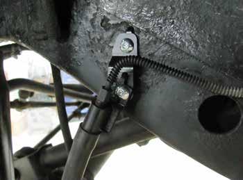 Tighten the stem mount until the bushings begin to swell. Re-install the coil spring retainer. Tighten the lower bolts to 20 ft-lbs. c. Position the lower suspension arms in the axle brackets. d.