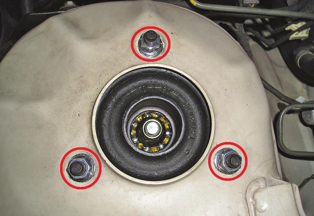 Disconnect the brake line from the strut assembly (fig. 2). fig. 2 2.