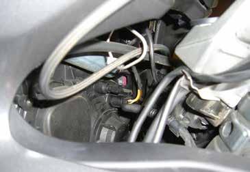 Tap into the Headlight wiring harness for switched power and the high beam trigger.