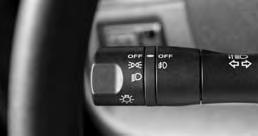 Turn the switch to the position to turn on the headlights. HIGH BEAM SELECT With the headlights on, push the headlight control switch forward to select the high beam function.