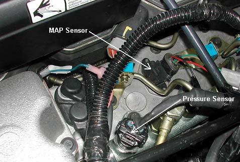 Disconnect the stock wiring harness at the sensor located on the main fuel rail on the driver s side towards the rear of the engine.