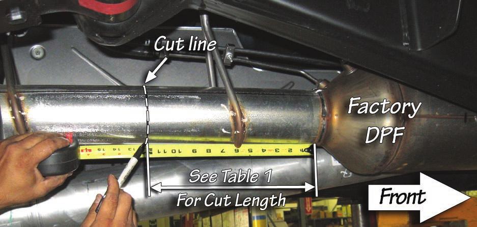 Figure 2 4. Remove the factory tailpipe from the vehicle by disengaging the exhaust system hanger pins from the rubber hangers using a large screw-driver or pry bar.