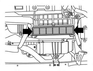 To replace the filter, perform the following procedure: 1. Open the glove box. 2. Remove the seven screws indicated above.