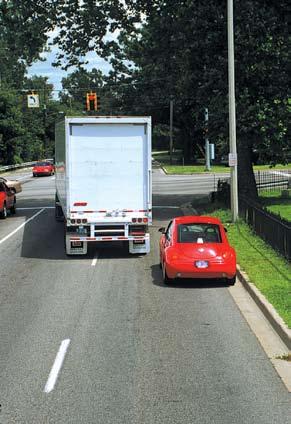 Trucks make wide right turns.