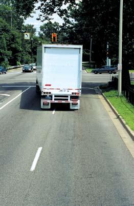 THE WRONG WAY 8 WRONG: Do NOT sneak into the right lane next to the truck.