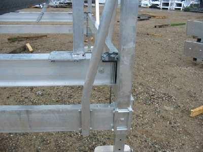 Showing cable fitting short end. From carriage beam attached to galvanized steel plate.