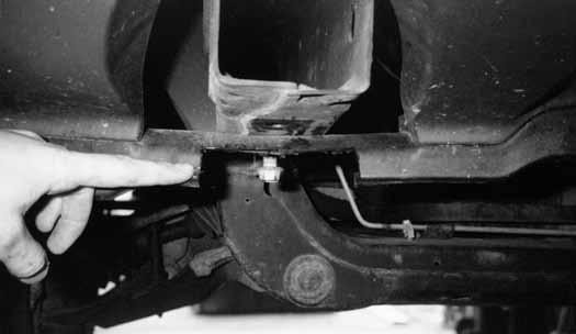 The valance can be sandwiched in between the frame and the tow hook. 74. Install tow hook in reverse of disassembly.