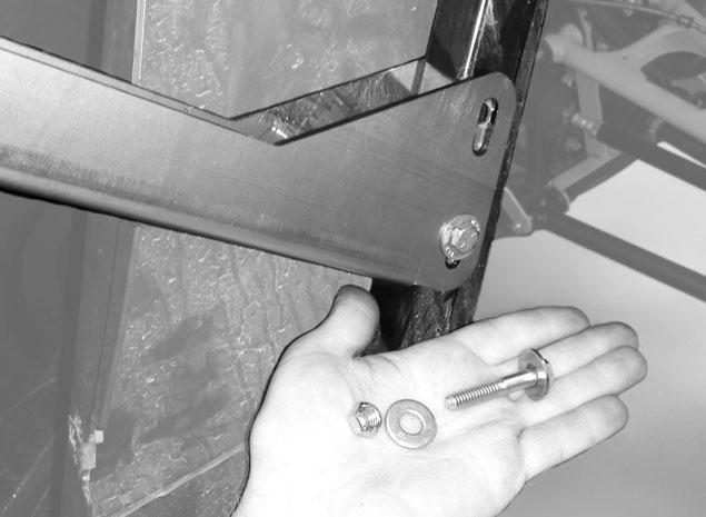 Step 17: Remove screws retaining B pillar plastics (the piece between the front and rear door openings).