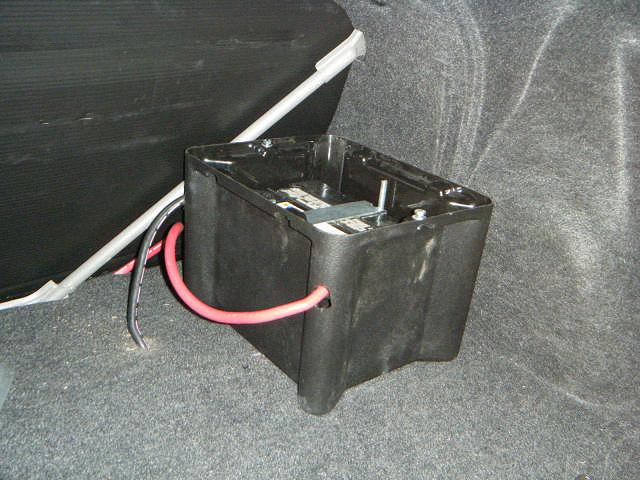 Battery Relocation kit is needed to move battery to back passenger side of trunk.