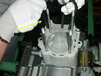 Use care not to damage sealing surface. If there is damage found on the cylinder head combustion chamber, it is recommended the component be replaced. CYLINDER HEAD WARP INSPECTION 1.