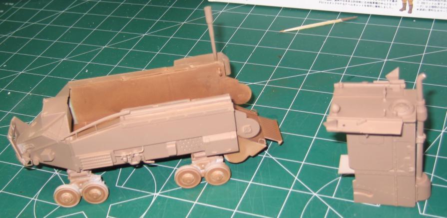 A rectangle of PE from some old project and bit of machinery from (I think) a 1/35 motorcycle. Starting to shape up!
