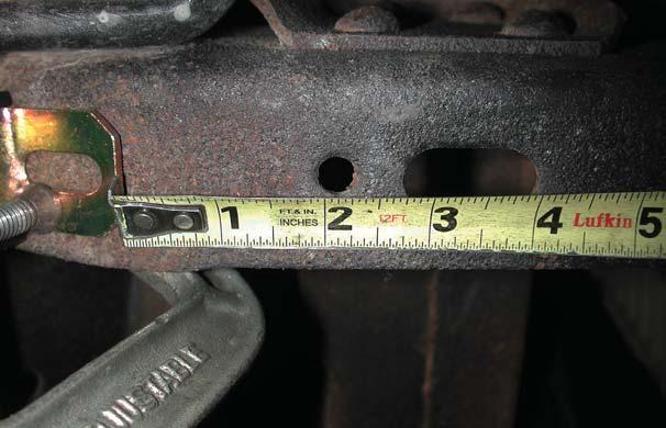 Four 3/8 x 1 ¼ bolts, Nylok nuts, and eight flat washers will secure it to the frame. 3. 3. For 63-72 Clamp the mount 2 ¾ behind the oval hole in the bottom of the frame.