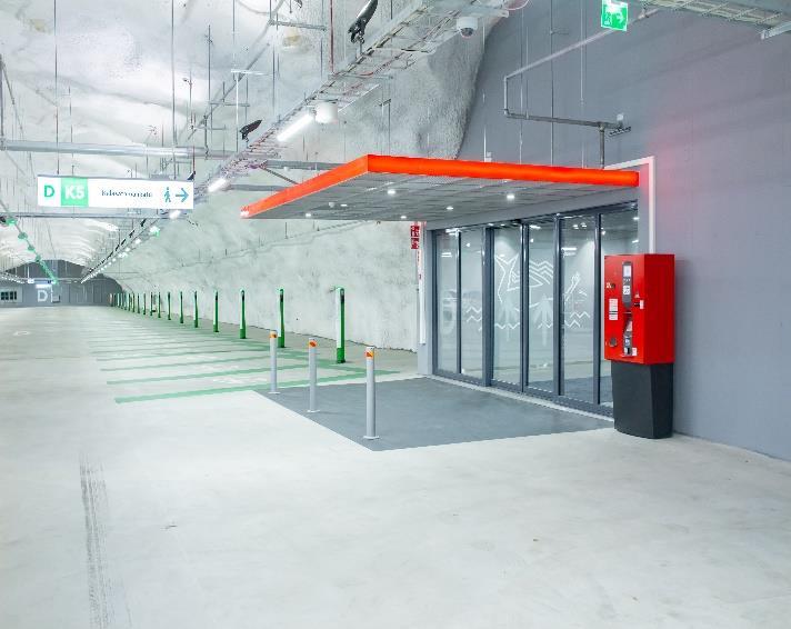 Utilizing a patented camera-based smart sensor system, way finding signage and red and green lights to identify open