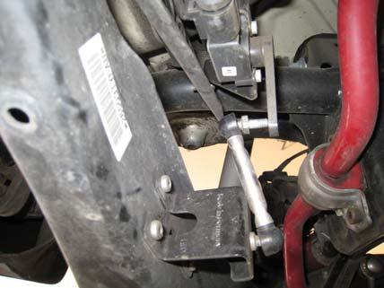Secure the sensor link to the lower control arm using the stock nut.
