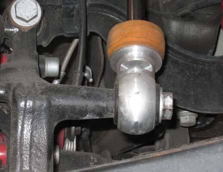 Secure the shock to the upper mount using the OE bolts as