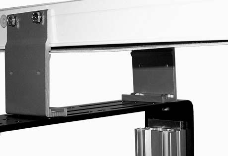 NOTE Mounting brackets for flat belt conveyors shown. Return Rollers Cleated Belt and - 6 (5-5 mm) Wide Flat Belt Conveyors. Locate return rollers.