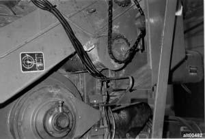 Figure 22. Flow and Moisture Sensor Cables routed over return tailings elevator to underside of cab. 6.