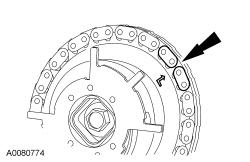 chain. 8. NOTE:Make sure the upper half of the timing chain is below the tensioner arm dowel.