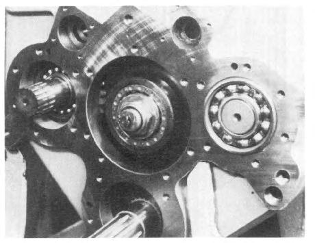 The shoulder on the race should be toward the gear; this will allow the cover and the roller bearing outer race and roller assembly to fit over the inner race (See Fig. 27). 9.