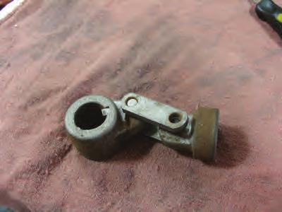 12 Attach stem nut to link by sliding over pin