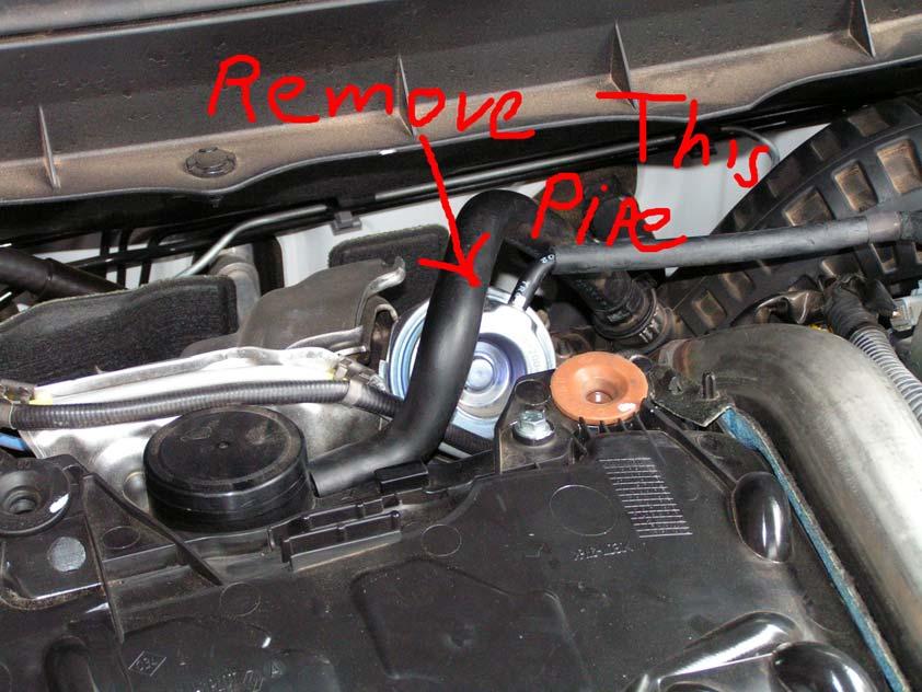 Remove the engine top cover 4 push in-plugs underneath Just run your fingers around underneath until you
