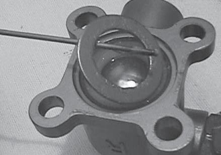 bushing (M-802) from the cavity. 13.