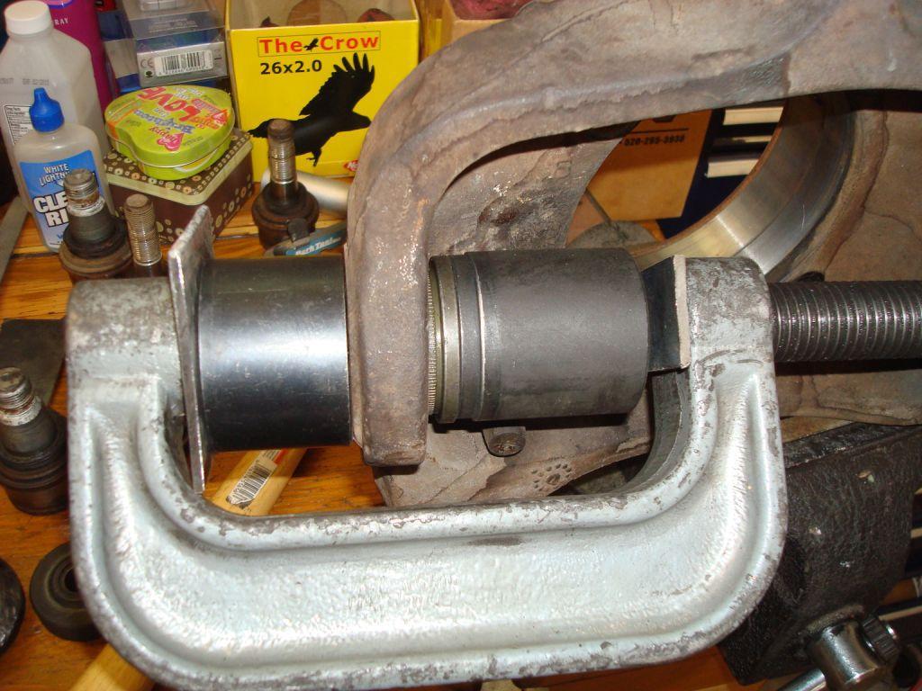 9) Removing and installing and the ball joints from the steering knuckle - the other single most frustrating aspect of the job. Not that it's particularly hard, if you have the right tools.