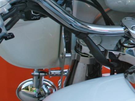 Yamaha V-Star 1100 uses 2 different sizes of Memphis Shades: Top -Memphis Shades Part #: MEM9954 Replace with 1 bolt and use a ½ Chrome Spacer. Bottom - Memphis Shade Part #: CVRD, No spacer needed.